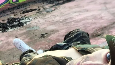 Army gear smoking and ball busting at public skatepark